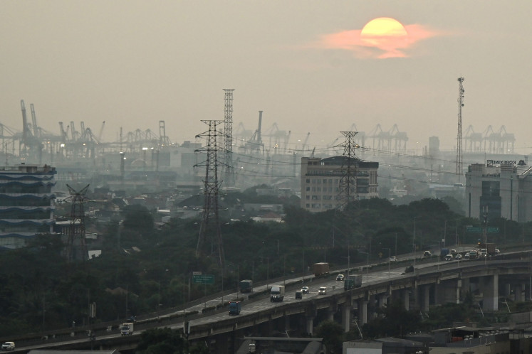 Tanjung Priok Port in North Jakarta is shrouded in haze from pollution on June 15, 2024.