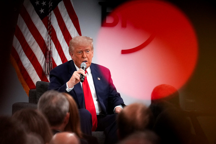 United States President Donald Trump delivers remarks on March 11 at the Business Roundtable's quarterly meeting at the Business Roundtable headquarters in Washington, DC.